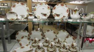 Approximately 65 pieces of Royal Albert Old Country Roses tea and dinner ware. (collect only).