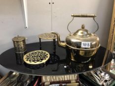 A brass kettle,