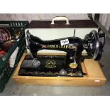 A Gold Leaf sewing machine (cover does not match it is just used to protect the machine)(Collect