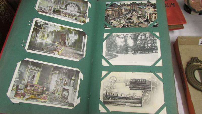 Three albums of postcards including an unusual double sided album, a scrap album, - Image 10 of 22