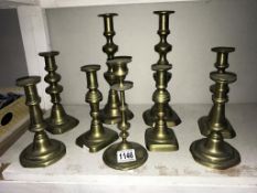 3 Victorian and 1 Georgian pairs of candlesticks plus a single one