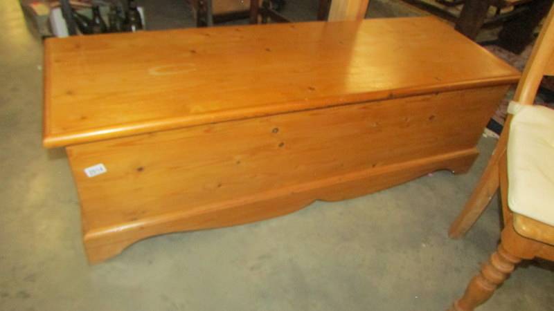 A pine blanket box, 55" x 18" x 17" high. (Collect only).