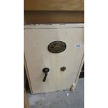 A heavy Griffith's & Sons, Wolverhampton safe with key. (Collect only).