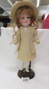 A Victorian porcelain doll, made in Germany, 390, A M.