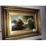 A 19th/20th century oil on board of wooded water scene (frame 42cm x 31cm, image 26cm x 15.