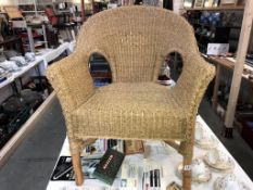 A Lloyd loom style rope twist arm chair with bamboo frame