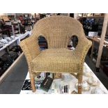 A Lloyd loom style rope twist arm chair with bamboo frame