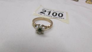 A 9ct gold seed pearl cluster ring, size M.