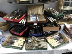 A large quantity of vintage cutlery and flatware