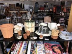A collection of studio pottery including whimsical items, paint pot, etc.