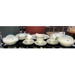 A 30 piece Susie Cooper green wedding band dinner set (1 tureen,