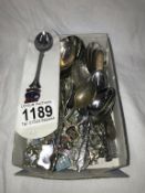 A quantity of collectors souvenir spoons