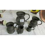 Five old pewter tankards, (some have dents).