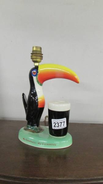 A Carlton War Guinness toucan table lamp base (needs wiring).