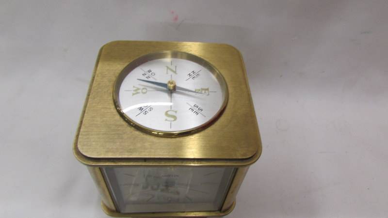 An Angelus circa 1950's Swiss gilt brass portable desk clock/weather station. - Image 5 of 6