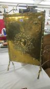 A brass fire screen. (Collect only).