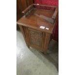 A mahogany coal cabinet (missing liner) (Collect only).