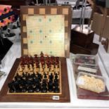 2 wooden chess sets (1 bishop missing) also 2 boards, draughts,