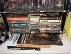 A quantity of Dungeons & Dragons related books including Dungeon Masters Guide, Players Handbooks,