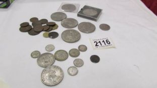 Approximately 40 grams of pre 1947 silver coins, six crowns and other coins.