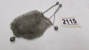 An antique mesh purse.