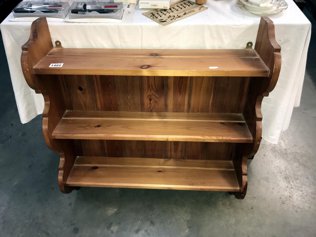 A solid pine kitchen plate rack shelf unit