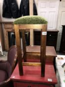 A vintage oak kitchen stool