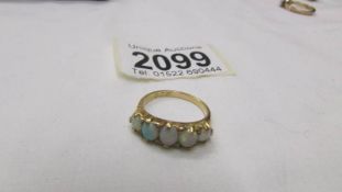 An 18ct gold ring set five opals, size M.