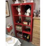 A red pigeon hole type bookcase shelf unit (79cm x 39cm x 150cm) (Collect only)
