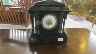 A black slate mantel clock. (Collect only).