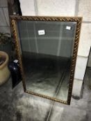 A gilt framed bevel edge mirror