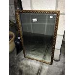 A gilt framed bevel edge mirror