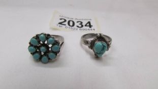 Two silver rings set turquoise.