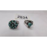 Two silver rings set turquoise.