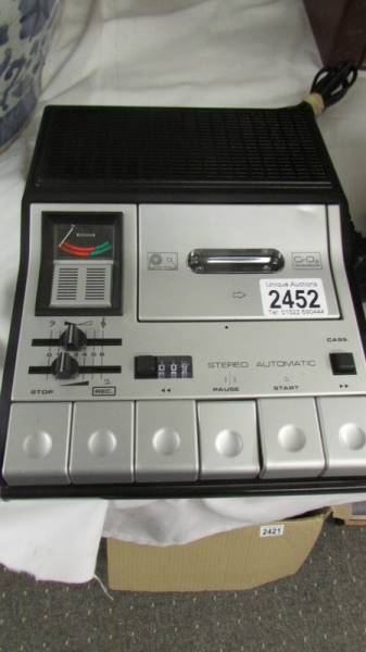 A stereo automatic cassette recorder.