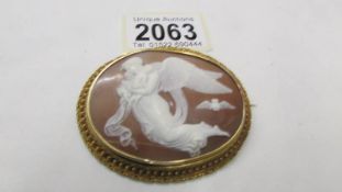 A superb carved cameo brooch depicting an angel set in yellow metal mount (tests as 9ct gold).