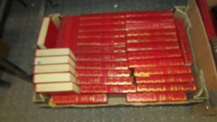 34 volumes of bound Agatha Christie novels.