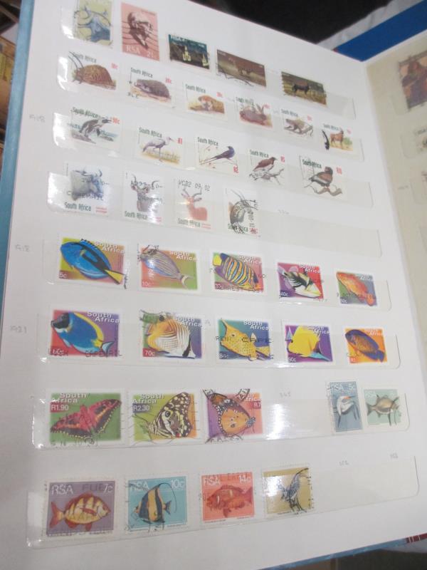 Six albums of commonwealth stamps. - Image 12 of 13