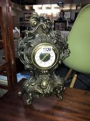 An antique brass plated spelter ormolu mantle clock