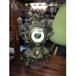 An antique brass plated spelter ormolu mantle clock