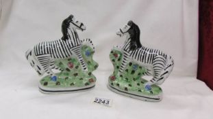 A pair of Staffordshire Zebra's.