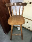 A tall kitchen chair