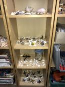 A large quantity of porcelain butterflies & sea shells etc.