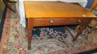 A two drawer side table. (Collect only).