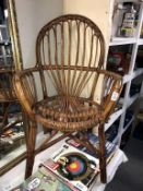 A vintage bamboo/cane arm chair