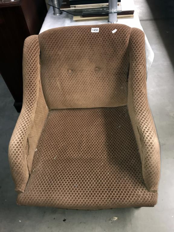 An Edwardian brown fabric covered tub/arm chair