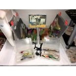 A good selection of colourful fishing lures etc