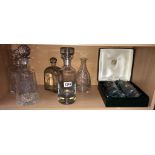 5 glass decanters, 1 engraved with golfer,