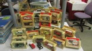 In excess of forty boxed die cast trade vehicles.