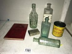 A quantity of vintage vet veterinary bottles & tin etc.